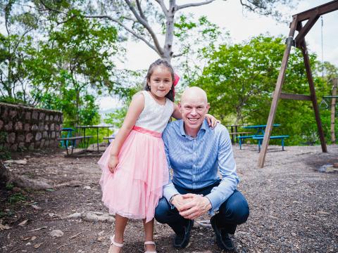 World Vision International President and CEO Andrew Morley speaks with children around the world